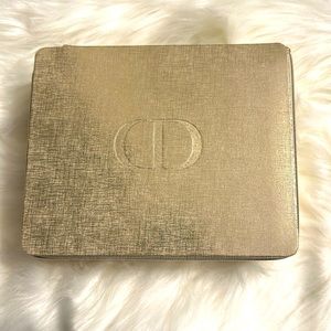 Dior travel case in light gold color